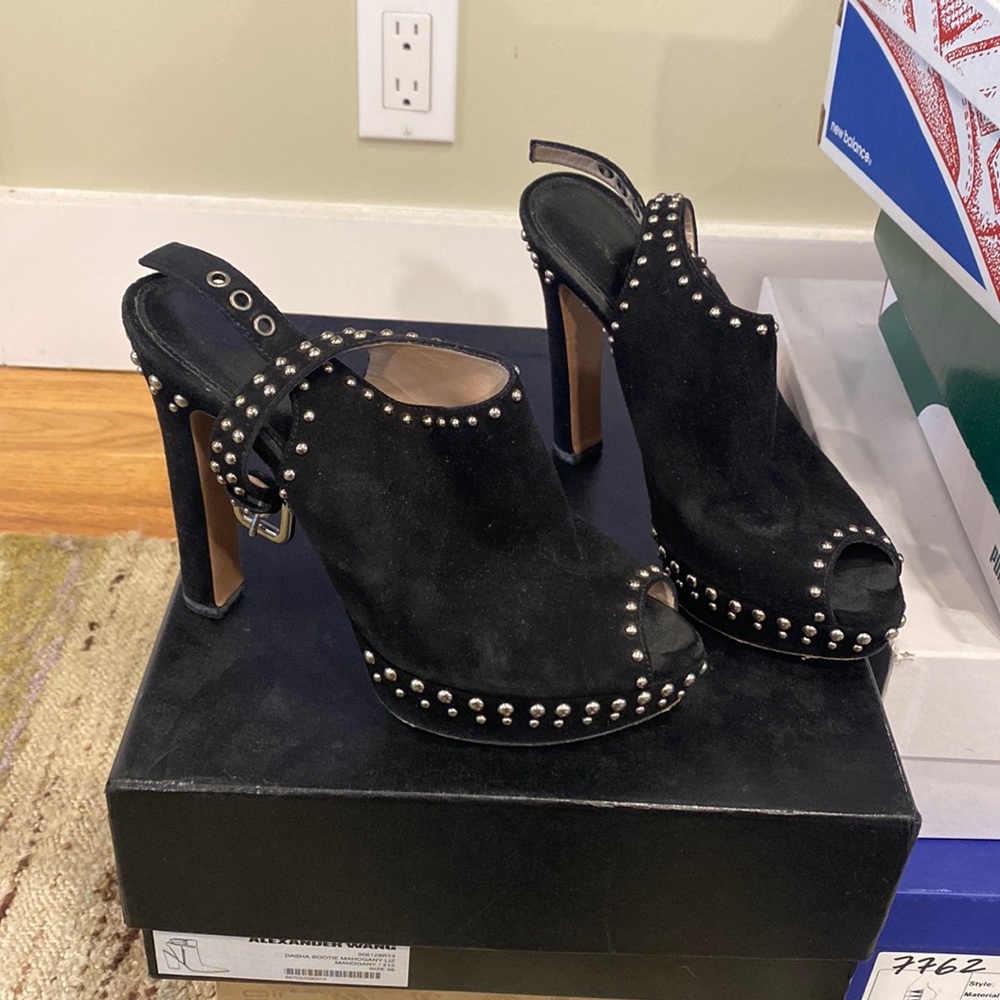 Black studded Prada mules